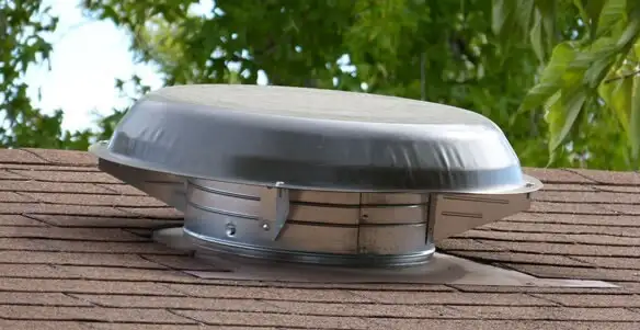 attic fan installation services with low-profile roof ventilation unit in Staten Island, NY