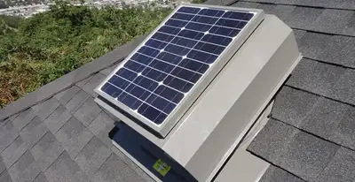 attic fan installation services with energy-efficient roof-mounted ventilation system in Staten Island, NY