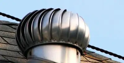 attic fan installation services with professionally installed roof ventilation unit in Staten Island, NY
