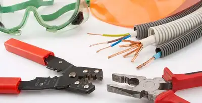 Electrical wiring repair with professional tools and safety equipment in Elizabeth, NJ