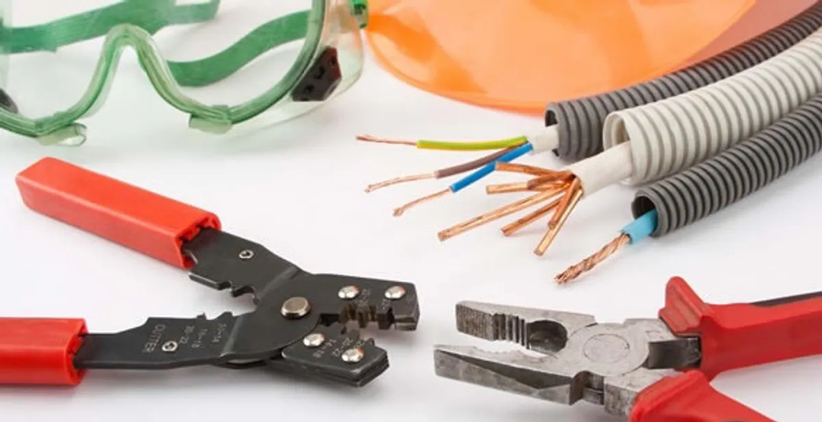 Electrical wiring repair with professional tools and safety equipment in Elizabethport, NJ