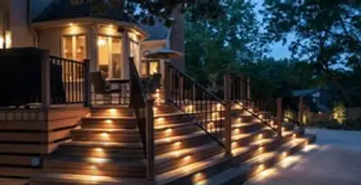 Residential electrician installing outdoor lighting for home safety in Staten Island, NY